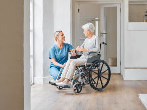 A senior using a wheelchair due to their mobility problems. Support and accessibility are vital for elderly well-being.