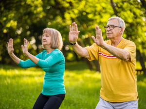 Seniors exercising to tackle their aging and flexibility issues, increasing their mobility and ensuring independence.